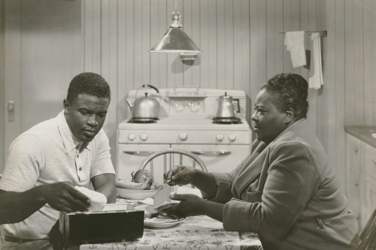 In this image, Jackie Robinson portrayed himself in The Jackie Robinson Story (1950), a film that highlighted the perseverance, character, and determination that continue to inspire young athletes today.